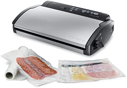 FoodSaver Machine Sous Vide | avec compartiment de rangement pour rouleau et cutter et 3 vitesses d'aspiration | inclut sacs de mise sous vide assortis | Silber mit schwarzen Akzenten | [V2860-I] Fiche Technique et Prix au Maroc