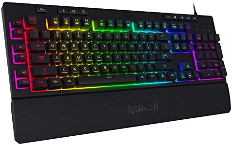 Redragon K512 Shiva Clavier de jeu à membrane rétroéclairé RVB avec touches multimédia, interrupteur linéaire à sensation mécanique, 6 touches macro supplémentaires intégrées, contrôle multimédia dédié, repose-poignet amovible
 Fiche Technique et Prix au Maroc
